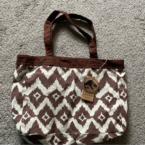 Jurassic World Accessories - Jurassic world X Accompany Geometric Distressed Tote Universal Studios Fandom